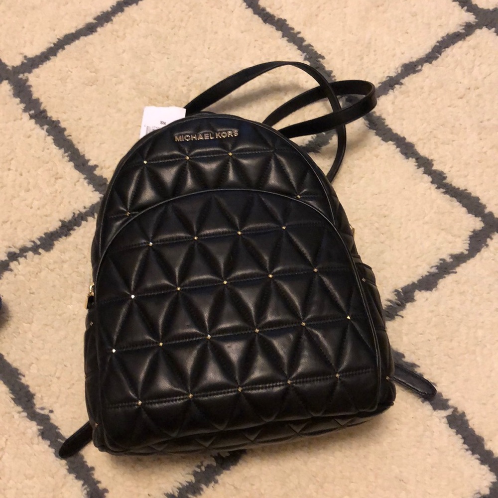 Michael Kors Black leather tufted backpack NWT
